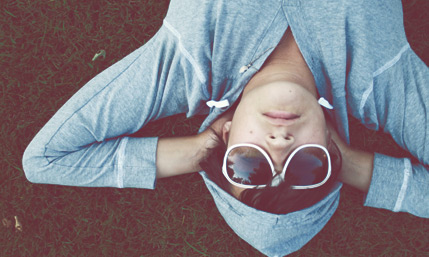 man lying on grass